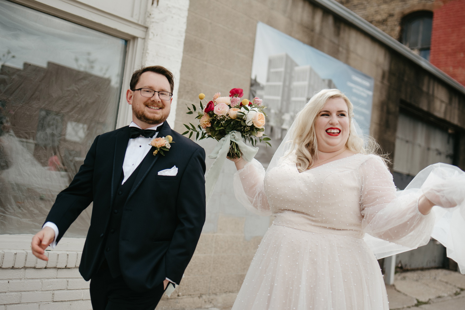 Bride and Groom walking around downtown Minneapolis