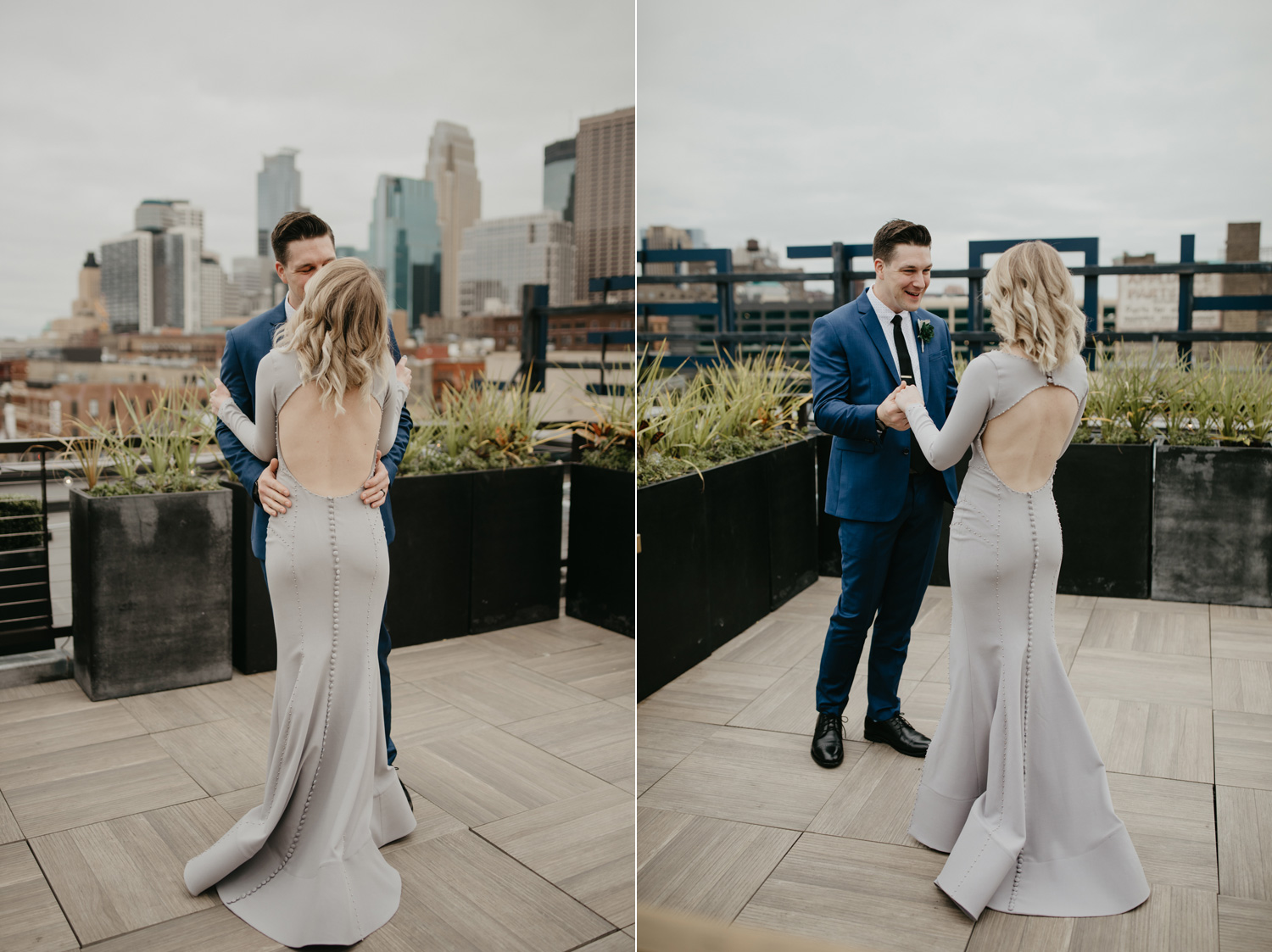 Groom seeing bride first look blue suit downtown Minneapolis rooftop