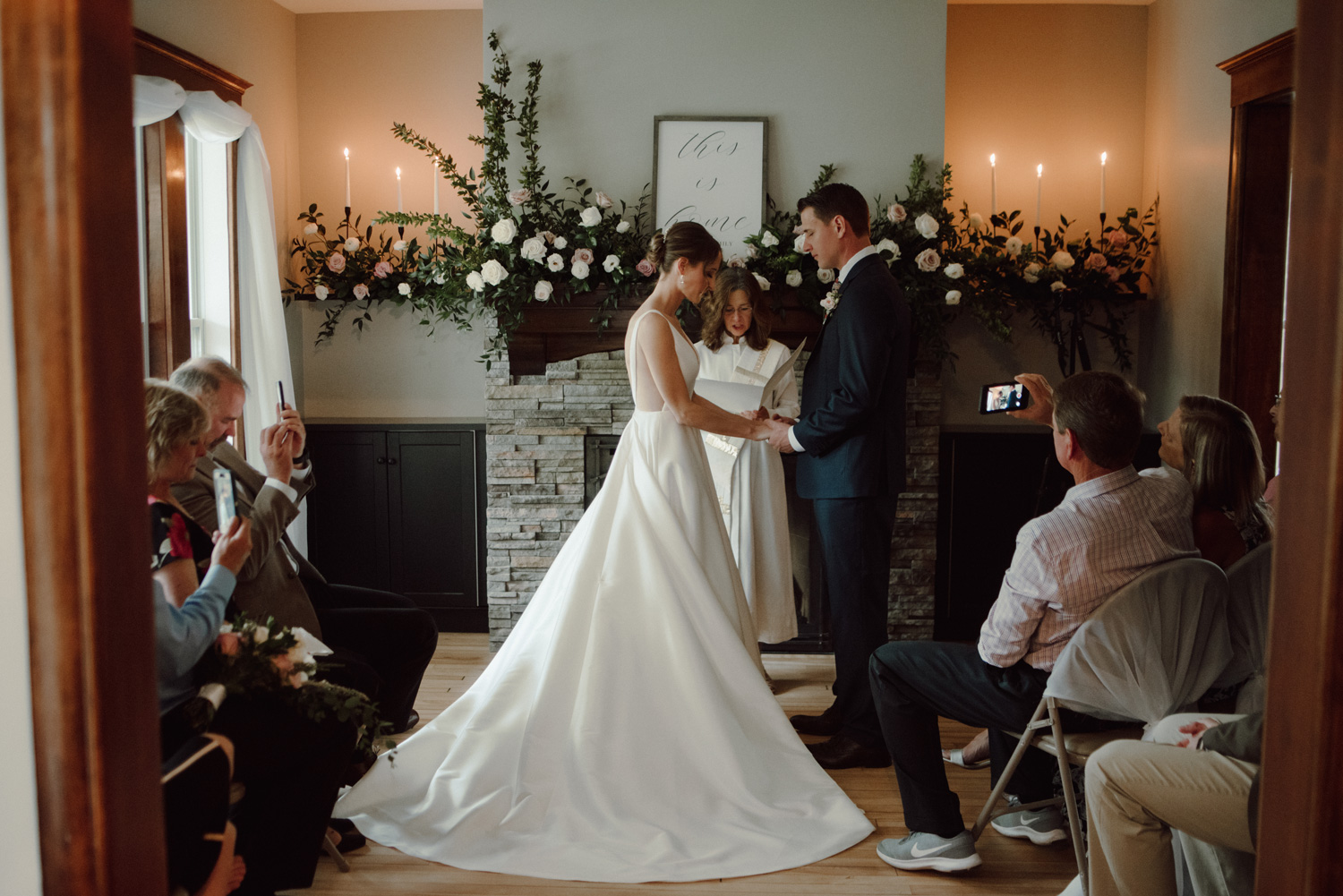 bride and groom during in home intimate wedding ceremony minneapolis