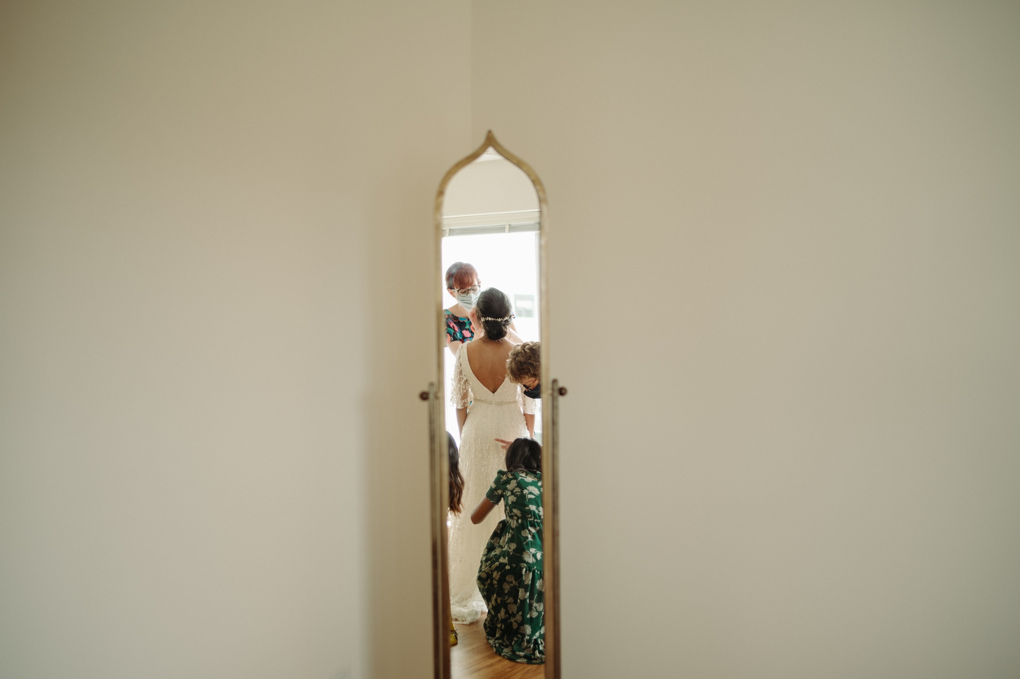 back of the bride in a mirror