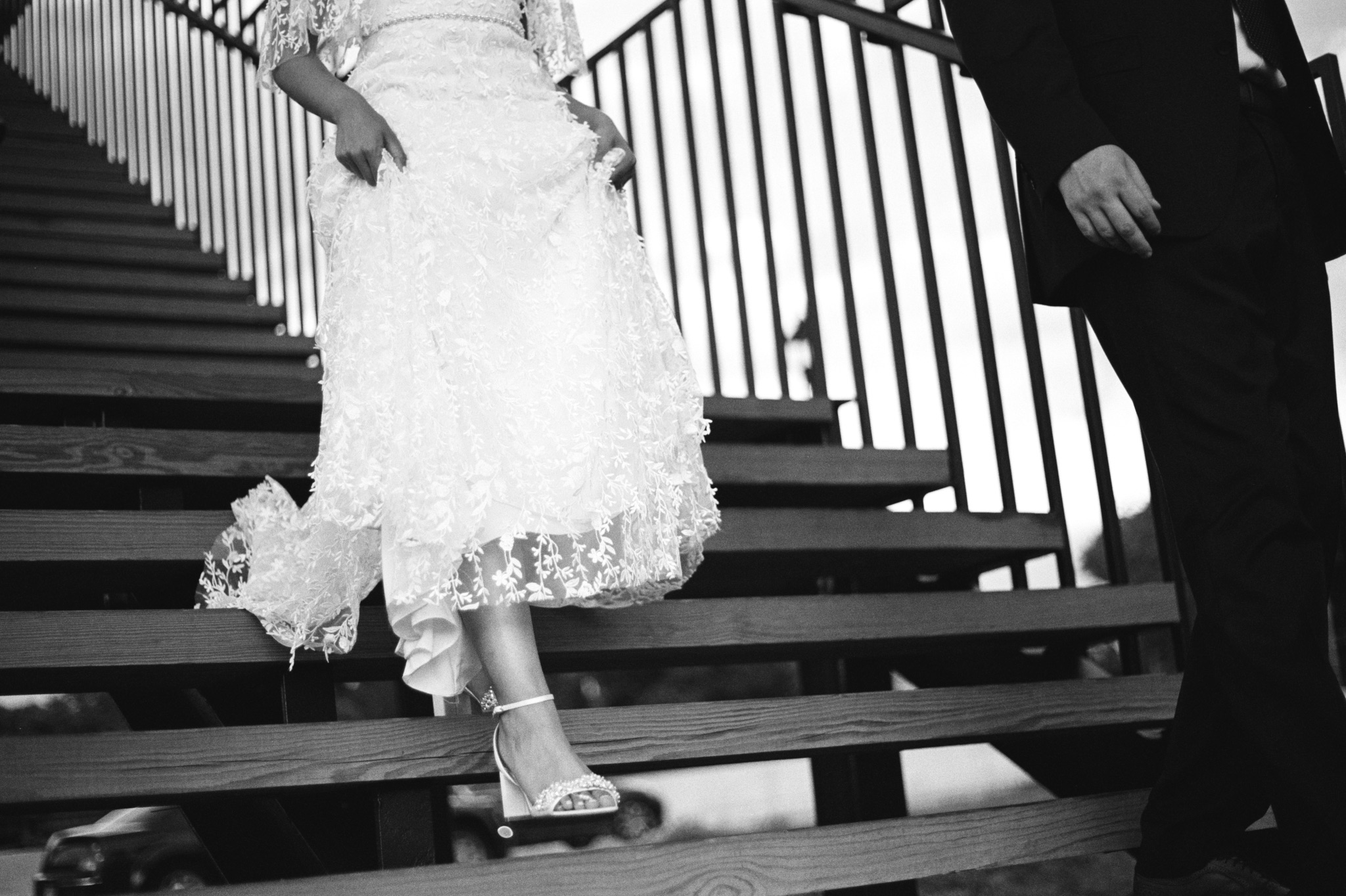 photo of bride from the waist down walking down stairs walker art center wedding