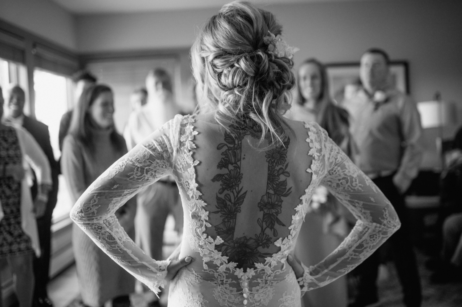 bride with back tattoo