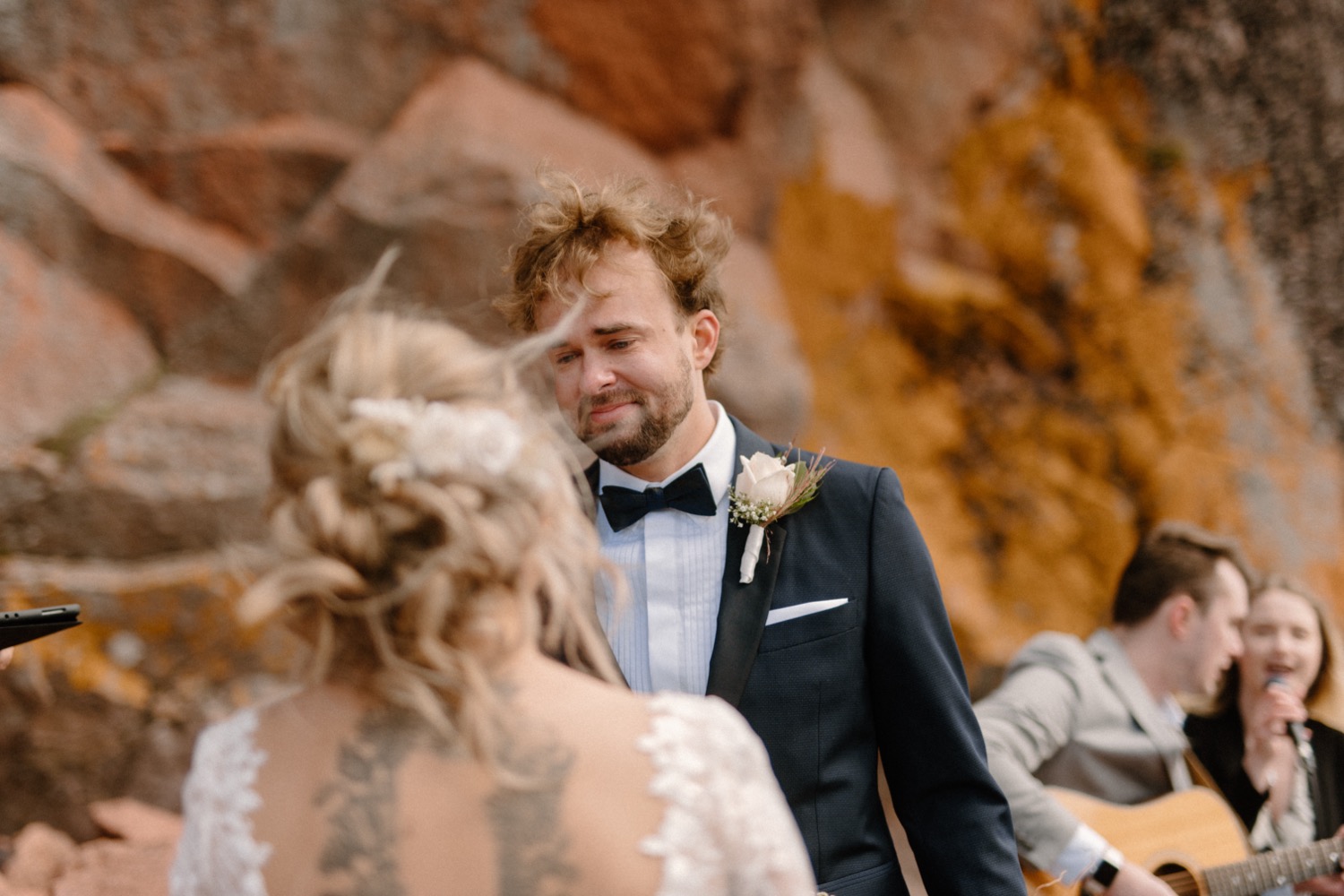 groom smiling at bride during intimate north shore wedding reception